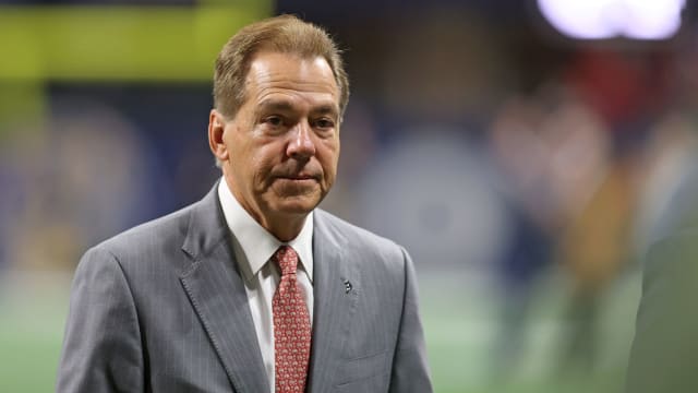 Alabama Crimson Tide head coach Nick Saban walks onto the field before the 2023 SEC Championship Game against the Georgia Bulldogs at Mercedes-Benz Stadium.